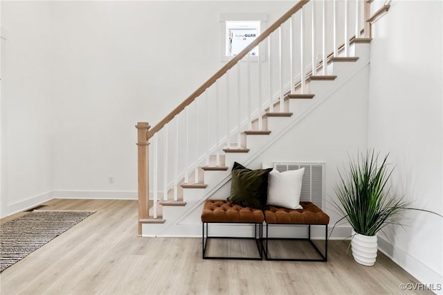 12731 Dell Hill Ct, Chester, VA 23831 - staircase featuring wood finished floors and baseboards