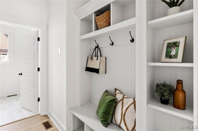12731 Dell Hill Ct, Chester, VA 23831 - mudroom with light wood-style floors, baseboards, and built in shelves