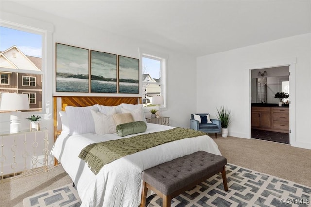 12731 Dell Hill Ct, Chester, VA 23831 - carpeted bedroom featuring baseboards and ensuite bathroom