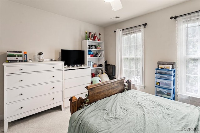 3321 Ceres Rd, Henrico, VA 23294 - carpeted bedroom with multiple windows and ceiling fan
