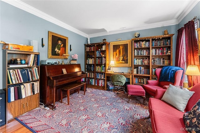 3321 Ceres Rd, Henrico, VA 23294 - sitting room featuring ornamental molding, wood finished floors, and wall of books
