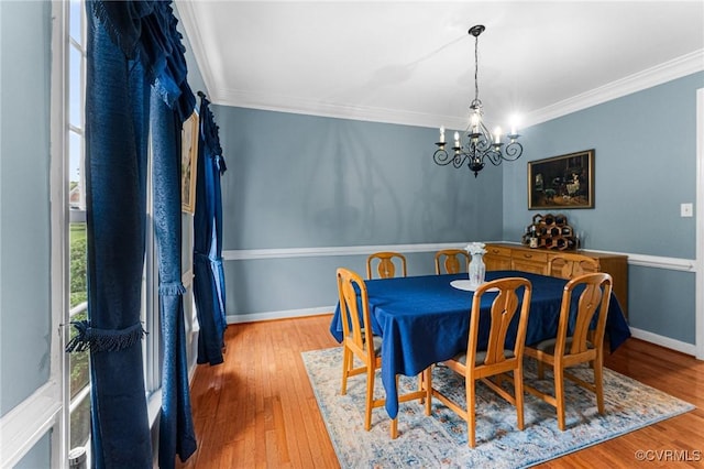 3321 Ceres Rd, Henrico, VA 23294 - dining space with a chandelier, ornamental molding, and wood finished floors