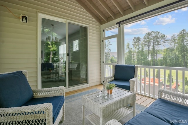 15942 Fishers Green Dr, Chesterfield, VA 23832 - sunroom featuring lofted ceiling, wood finished floors, wood ceiling, an outdoor living space, and wooden walls