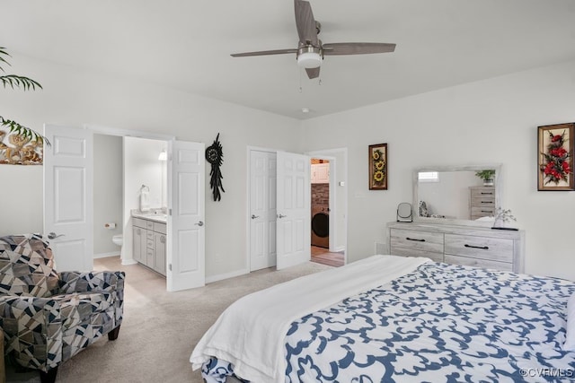 15942 Fishers Green Dr, Chesterfield, VA 23832 - bedroom with washer / clothes dryer, light colored carpet, ensuite bathroom, and ceiling fan