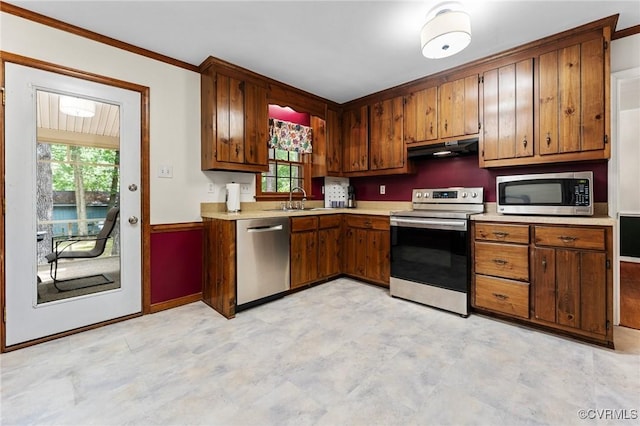 4337 Collingswood Dr, Chesterfield, VA 23832 - kitchen featuring appliances with stainless steel finishes, under cabinet range hood, light countertops, plenty of natural light, and ornamental molding