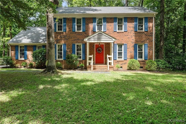 4337 Collingswood Dr, Chesterfield, VA 23832 - view of front facade with a front yard and brick siding