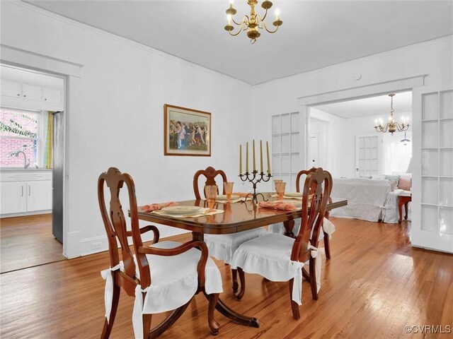 110 Gatewood Ave, Crewe, VA 23930 - dining area featuring a chandelier and light wood finished floors