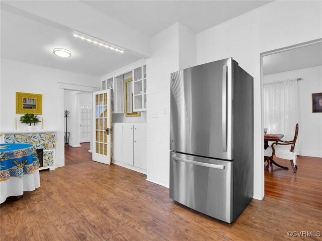 110 Gatewood Ave, Crewe, VA 23930 - kitchen featuring freestanding refrigerator, wood finished floors, baseboards, and french doors
