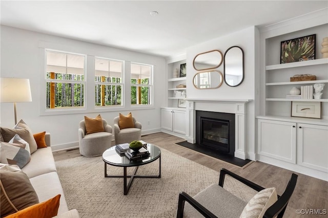 9496 Angels Share Dr, New Kent, VA 23124 - living area with baseboards and wood finished floors