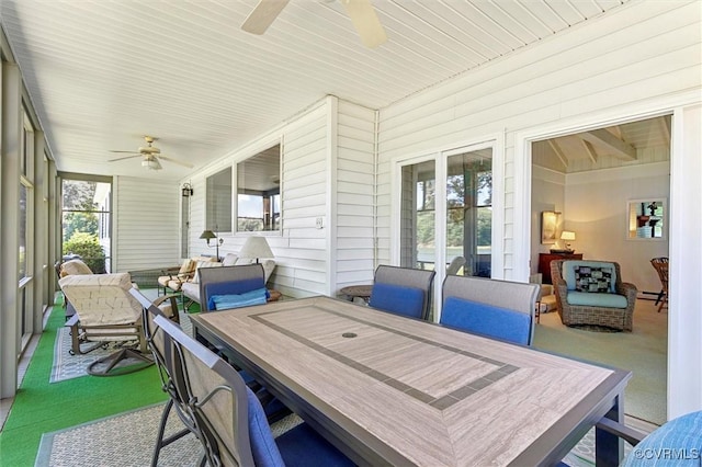 183 Nimcock Rd, Urbanna, VA 23175 - sunroom / solarium featuring ceiling fan and outdoor dining space