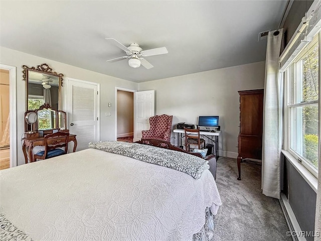 183 Nimcock Rd, Urbanna, VA 23175 - bedroom with carpet floors, baseboards, and ceiling fan