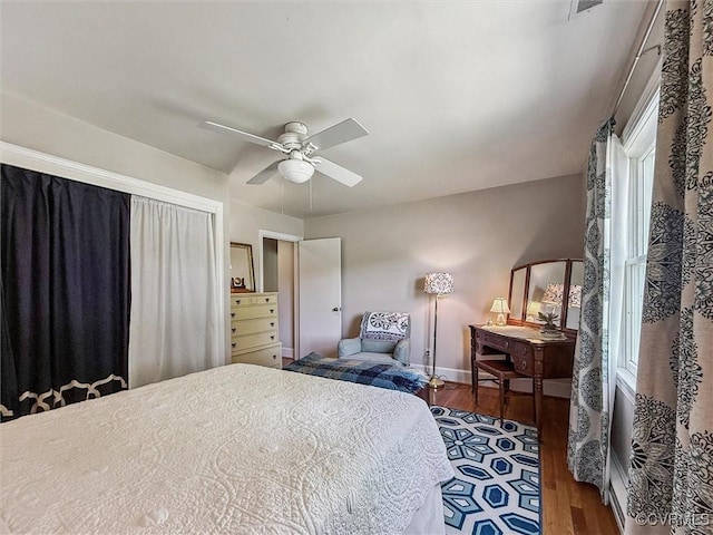 183 Nimcock Rd, Urbanna, VA 23175 - bedroom featuring wood finished floors, baseboards, and ceiling fan