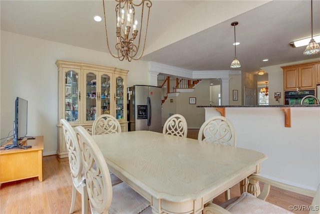 1306 Bach Ter, Chesterfield, VA 23114 - dining area featuring light wood-style flooring, baseboards, a chandelier, decorative columns, and recessed lighting