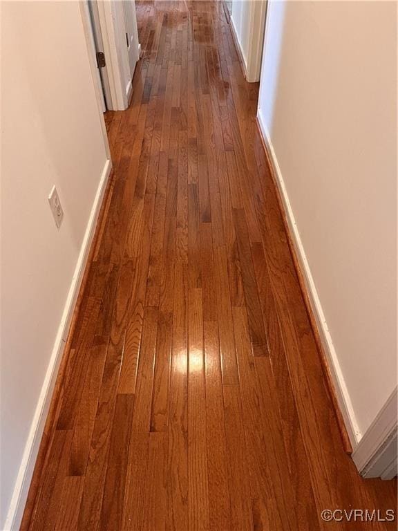 2212 Sara Ann Ct, Aylett, VA 23009 - corridor featuring dark wood-style floors and baseboards