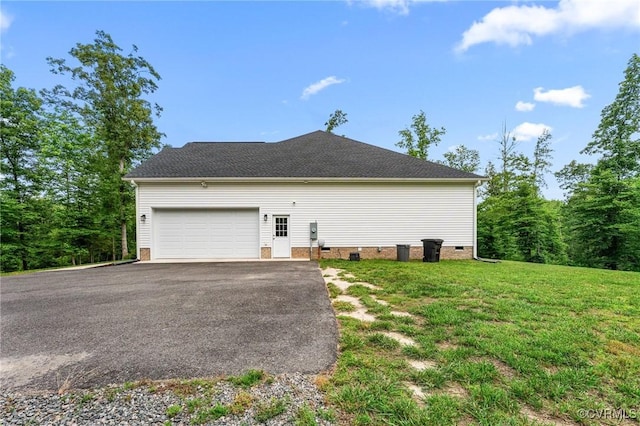 216 Edwin Cir, Aylett, VA 23009 - view of side of home featuring crawl space, asphalt driveway, a garage, and a lawn
