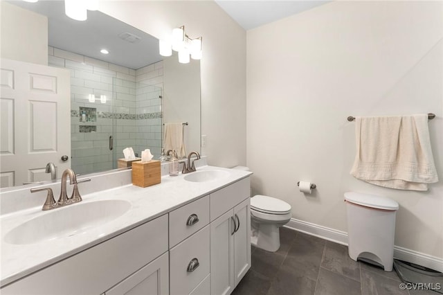216 Edwin Cir, Aylett, VA 23009 - bathroom with double vanity, baseboards, toilet, and a stall shower