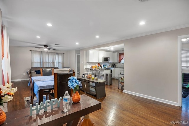 1939 Burks St, Petersburg, VA 23805 - dining space with baseboards, dark wood-style floors, ceiling fan, recessed lighting, and crown molding
