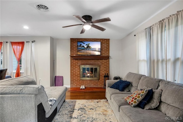 1939 Burks St, Petersburg, VA 23805 - living area with wood finished floors, ceiling fan, a fireplace, and recessed lighting
