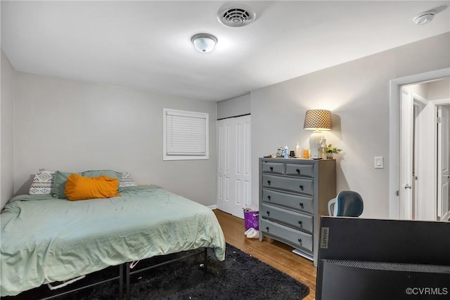 1939 Burks St, Petersburg, VA 23805 - bedroom featuring wood finished floors and a closet