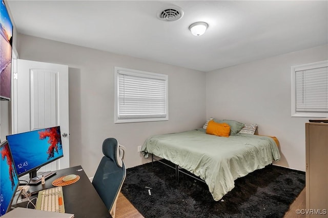 1939 Burks St, Petersburg, VA 23805 - bedroom with wood finished floors and an office area
