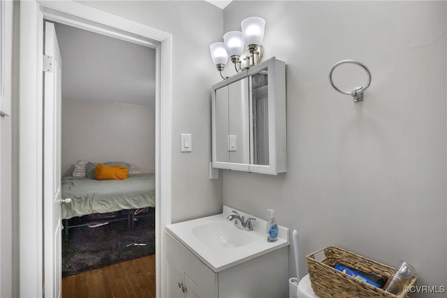 1939 Burks St, Petersburg, VA 23805 - bathroom with vanity, wood finished floors, and toilet