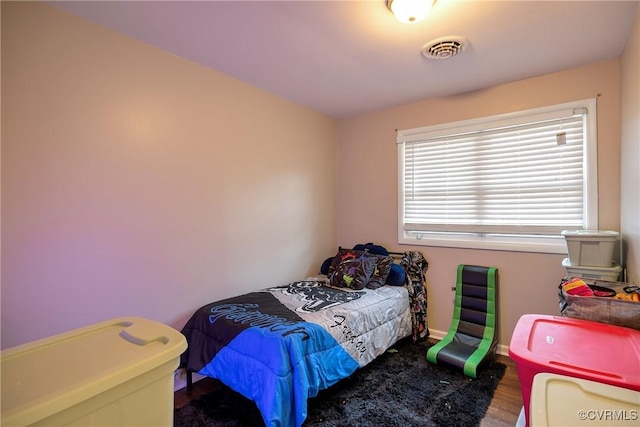 1939 Burks St, Petersburg, VA 23805 - bedroom with baseboards and wood finished floors