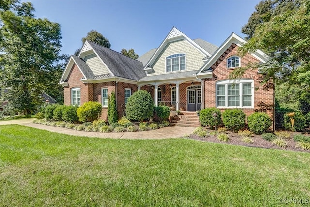 12700 Dell Hill Ct, Chester, VA 23831 - view of front facade with brick siding, a front yard, roof with shingles, and covered porch