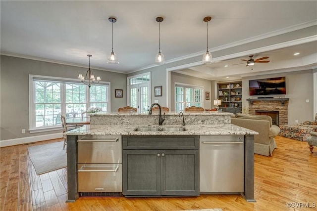 12700 Dell Hill Ct, Chester, VA 23831 - kitchen with a sink, crown molding, open floor plan, gray cabinetry, and a fireplace