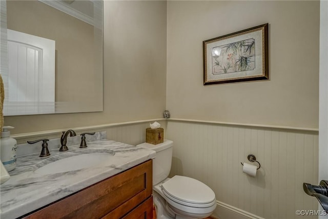 12700 Dell Hill Ct, Chester, VA 23831 - bathroom with toilet, vanity, and wainscoting