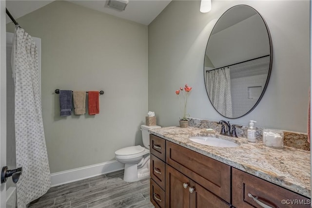 12700 Dell Hill Ct, Chester, VA 23831 - full bath featuring vanity, wood finished floors, toilet, baseboards, and a shower with shower curtain