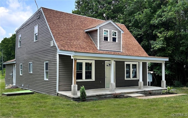 7906 Battlefield Park Rd, Henrico, VA 23231 - view of front of home featuring roof with shingles, a porch, and a front lawn