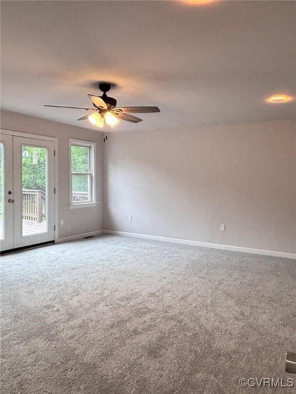 7906 Battlefield Park Rd, Henrico, VA 23231 - carpeted empty room with french doors and a ceiling fan