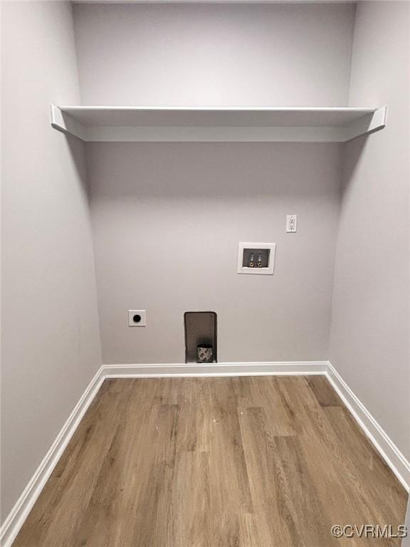7906 Battlefield Park Rd, Henrico, VA 23231 - laundry room with wood finished floors, hookup for a washing machine, and electric dryer hookup
