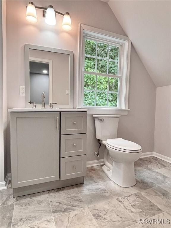 7906 Battlefield Park Rd, Henrico, VA 23231 - bathroom with vaulted ceiling, vanity, and marble finish floors