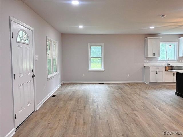 7906 Battlefield Park Rd, Henrico, VA 23231 - foyer with healthy amount of natural light, light wood-type flooring, and recessed lighting