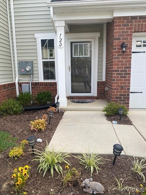 120 De La Warr Arch, Williamsburg, VA 23185 - entrance to property with brick siding