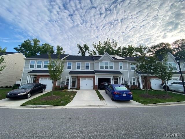120 De La Warr Arch, Williamsburg, VA 23185 - view of property with driveway and a garage