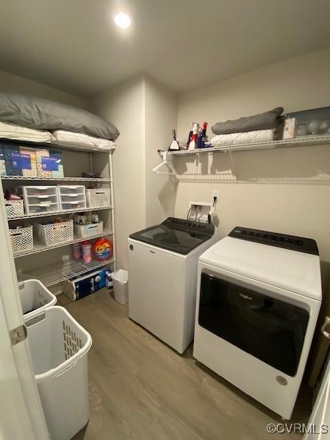 120 De La Warr Arch, Williamsburg, VA 23185 - laundry room with washing machine and dryer and wood finished floors