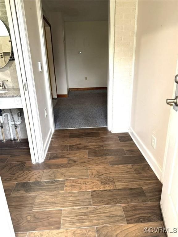 5404 Oak St, North Dinwiddie, VA 23803 - hallway with dark wood-style flooring and baseboards