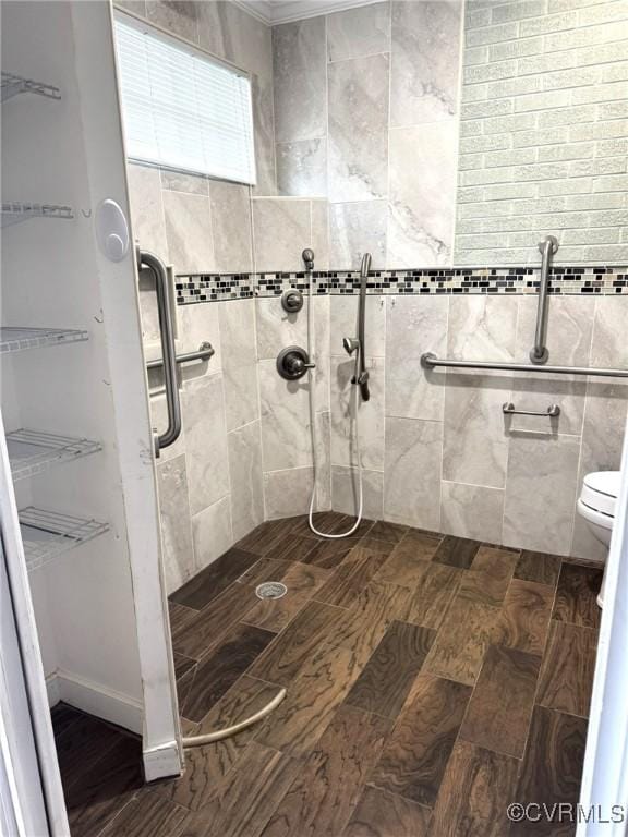 5404 Oak St, North Dinwiddie, VA 23803 - full bath featuring a tile shower, wood finished floors, and ornamental molding