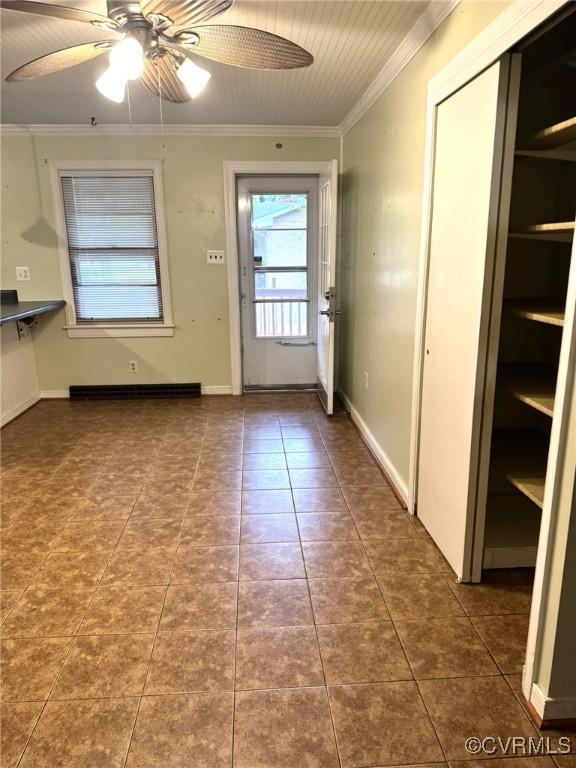 5404 Oak St, North Dinwiddie, VA 23803 - entryway featuring ornamental molding, a ceiling fan, tile patterned floors, and baseboards