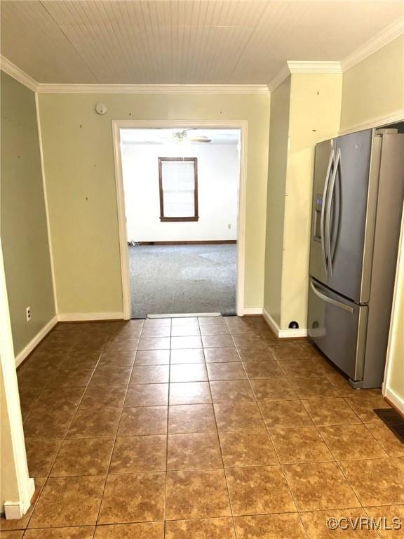 5404 Oak St, North Dinwiddie, VA 23803 - kitchen featuring stainless steel fridge with ice dispenser, crown molding, carpet, and tile patterned floors
