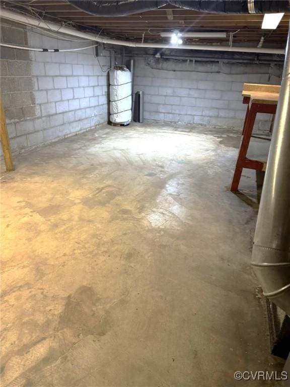 5404 Oak St, North Dinwiddie, VA 23803 - unfinished basement featuring water heater