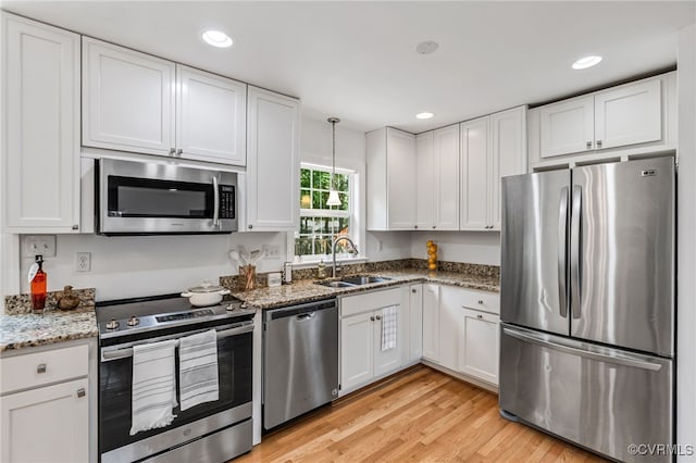 6124 Manuel Ct, Chesterfield, VA 23234 - kitchen with stainless steel appliances, a sink, white cabinetry, and recessed lighting