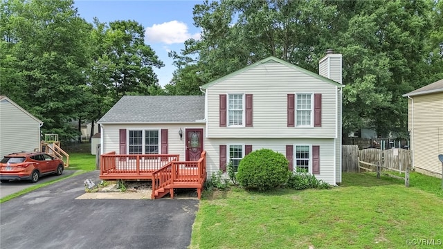6124 Manuel Ct, Chesterfield, VA 23234 - tri-level home featuring a deck, a chimney, and asphalt driveway