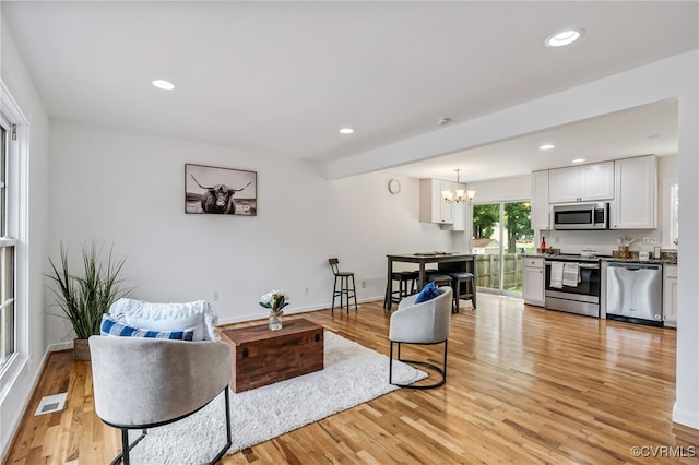 6124 Manuel Ct, Chesterfield, VA 23234 - living area featuring a chandelier, light wood-style flooring, recessed lighting, and baseboards