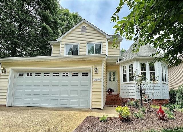 12503 Winchester Green Ct, Henrico, VA 23233 - traditional-style house with entry steps, concrete driveway, and a garage