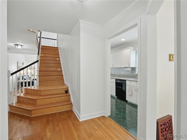 12503 Winchester Green Ct, Henrico, VA 23233 - staircase with crown molding and wood finished floors