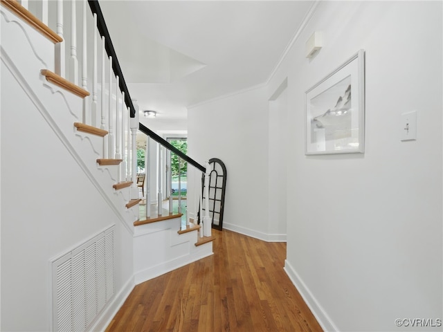 12503 Winchester Green Ct, Henrico, VA 23233 - hallway featuring wood finished floors, stairway, and ornamental molding