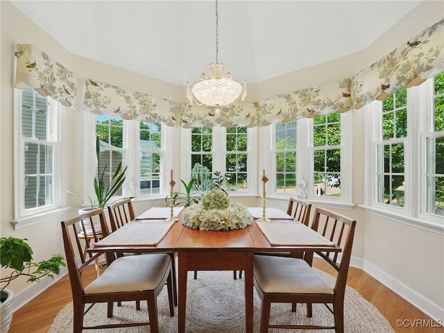 12503 Winchester Green Ct, Henrico, VA 23233 - dining space with light wood-type flooring and a chandelier